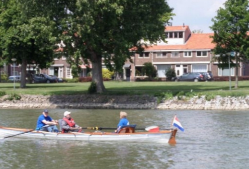 gehandicpten-roeien-artikel-krant-foto